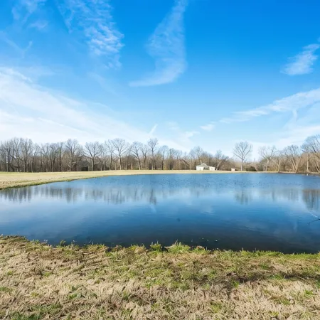Country Living at Its Best, with a Beautiful Stocked Pond to Fish IN