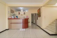 RedDoorz @ Jalan Kolonel Haji Burlian Palembang 2 Hotel di Karya Baru
