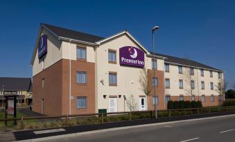 "a building with a purple sign that says "" premier inn "" is shown on a street" at Premier Inn Herne Bay