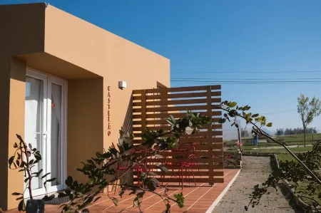 Entre Vinhas & Mar Отели рядом с достопримечательностью «Praia D'El Rey Golf Course»