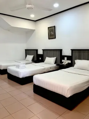 Intan Beach Resort Hotels near Batu Buruk beach