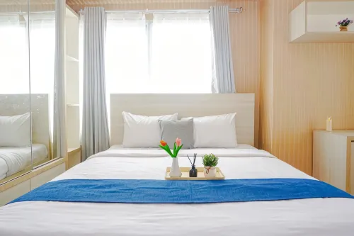 Comfortable and Pleasant Studio at Apartment Tamansari Mahogany Karawang By Travelio - Homestays