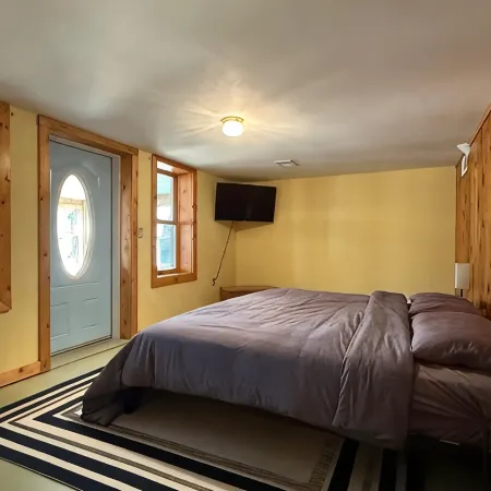 Spacious Lakefront Home with Nostalgic Charm, Wifi, AC and a Boat Dock