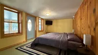Spacious Lakefront Home with Nostalgic Charm, Wifi, AC and a Boat Dock