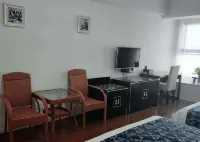 Guan County Hong Pu Traders Hotel