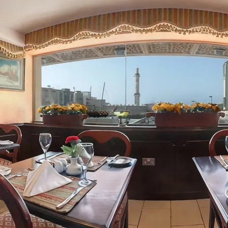 Arabian Courtyard Hotel & Spa Отели рядом с достопримечательностью «Район Бастакия»