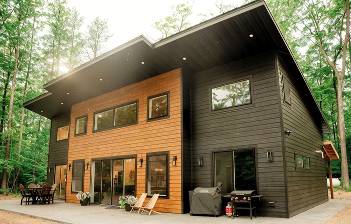Modern mountain- inspired monoslope home located in the beautiful Northwoods