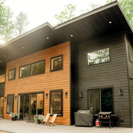 Modern mountain- inspired monoslope home located in the beautiful Northwoods