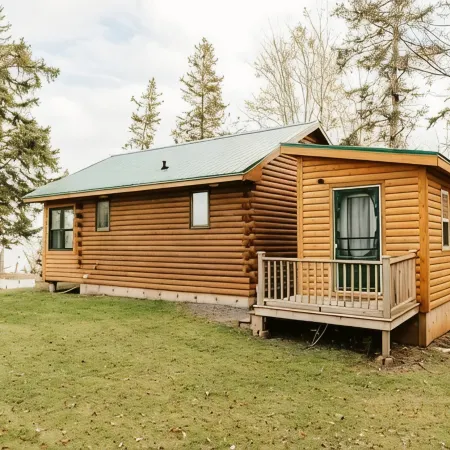 Escape to Tranquility at The Sandy Pearl: A Cozy Log Cottage Retreat