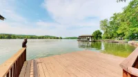 Lake Front house on Watts Bar Lake with large private dock, 2 screen porches
