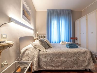 Large and bright penthouse in the heart of the city of Parma near the station