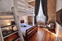 Octopus Lounge on Strand- historic neighborhood, local shops and dining - Condos