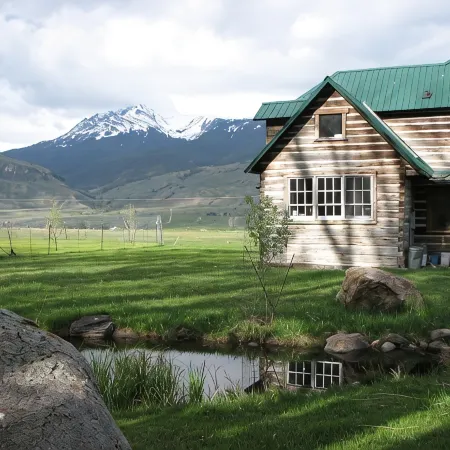 Historic 2 Story Hand-Hewn Log Cabin Next to Yellowstone Park
