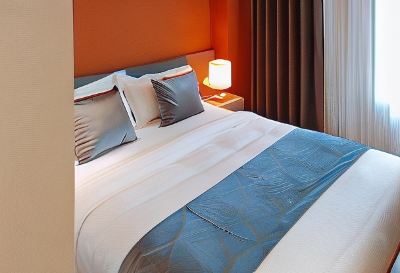 Deluxe Queen Room Sans Hotel at The Luxebridge Suites Davao Photo