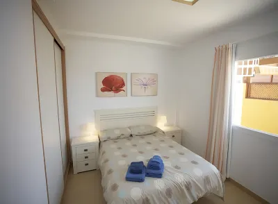 Golden Beach n. 12, Top Floor Apartment with Private Roof Terrace by El Sirocco