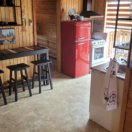 Modern Costa Del Sol Flat Overlooking Pokemouche River, with swimming off dock.