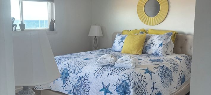 Newly Renovated- Oceanfront Condo Queen’s Grant - WiFi, Pool, Boat Ramp & Dock Hotels in Topsail