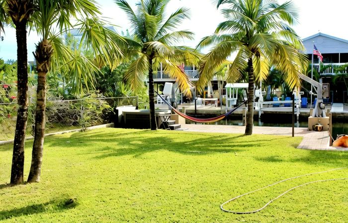 Tropical 5BR Paradise,  Private Pool, Hot Tub, Canal Access – Sleeps 12