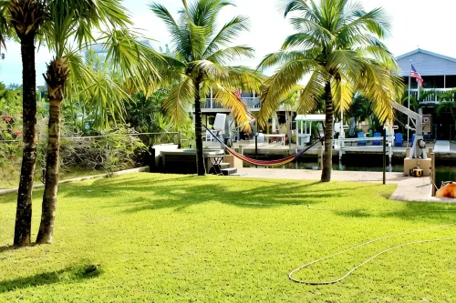 Tropical 5BR Paradise,  Private Pool, Hot Tub, Canal Access – Sleeps 12 - Wifi