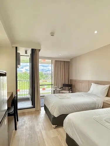 รูปภาพของรังสิต เรสซิเดนซ์ แอนด์ โฮเทล by HOTEL DD