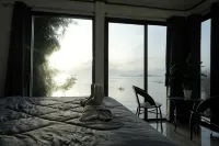 Room in front of Sunset Beach - Homestays