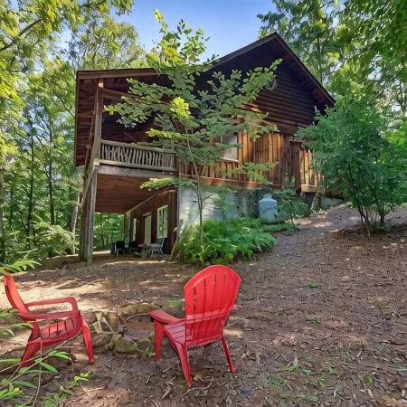A Laurel Haven, with big porches and a log cabin feel. Fireplace.