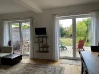 Modern holiday apartment with a large terrace and garden near Hamburg