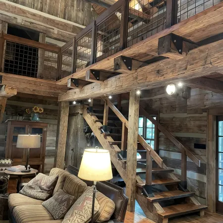 Prospect Mountain Cabin custom log home sportsman's paradise with fishing lake.