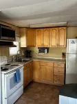 Canal-Front Coastal Escape with Private Dock & King Suite - Homestays
