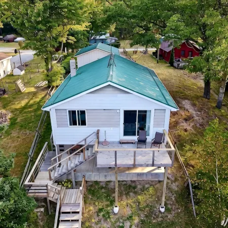 Cottage right on the AuSable River in charming Mio