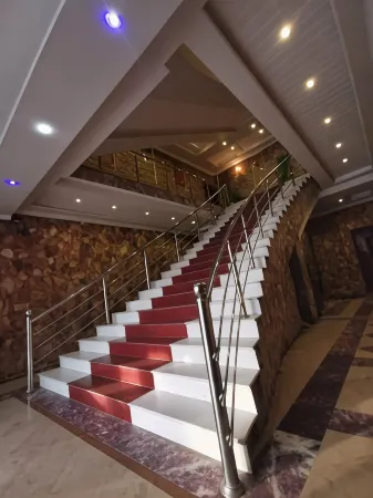 Triple One Hotel Suites Отели рядом с достопримечательностью «Университет Инжиниринг & Текнолоджи Абботтабад Кампус»