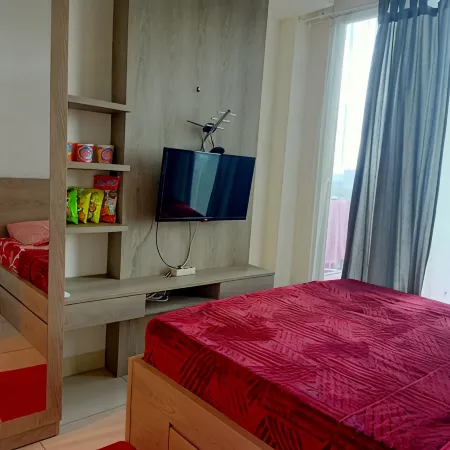 Thara Place Treepark BSD Отели рядом с достопримечательностью «Торговый центр Teraskota BSD»