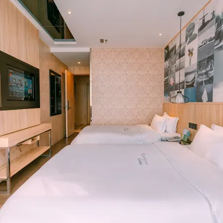 Qingmu Chain Hotel (Ma'an Shandong Railway Station Hongxing Meikailong RT-Mart)