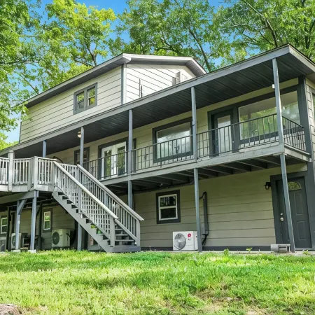 Spacious 4-bedroom Retreat on Table Rock Lake. Darts, Air Hockey, and More!