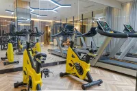 Nanyang Okey Elegant Style Hotel (Wanda Jianye Triumph Square Dushan Avenue Branch) - Gym