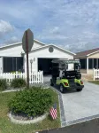 Refurbished villa with golf cart, great location, corner lot
