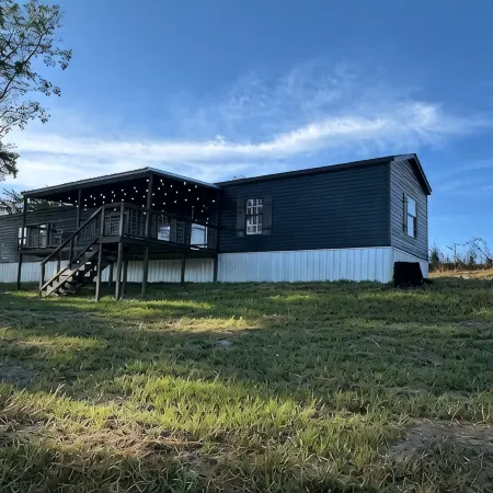 Private Cabin, 3 Bed Rooms, 2 Bath, nestled in the woods on a spring fed pond!!!