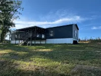 Private Cabin, 3 Bed Rooms, 2 Bath, nestled in the woods on a spring fed pond!!!