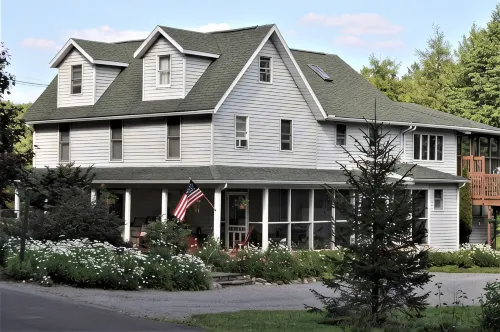 Two Bedroom Across from Outlet Pond on edge of village and wooded trails.