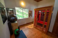 Tranquil Forested Cabin with Sauna, Home Gym, & AC - Boutique