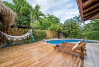 Spacious 3-Bedroom Villa. with a pool, rancho- STEPS away from Langosta Beach. - Villas