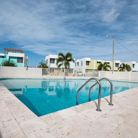 Beachfront in gated community with patio, balcony, pool, close to all in Rincón