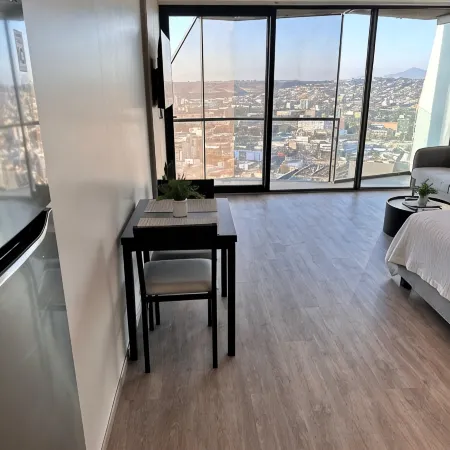 Cozy 1-bedroom condo with WiFi, fitness room in cool Tijuana