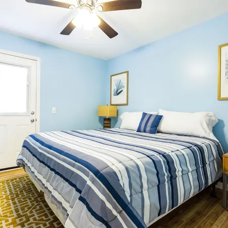 Gulf View Condo with Pool & Grills. Minute walk to Beach. Pet-Friendly!