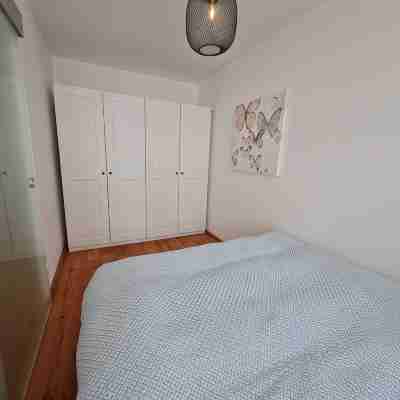 Modern city apartment with balcony and private parking space in a quiet location Rooms