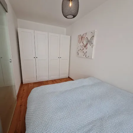 Modern city apartment with balcony and private parking space in a quiet location