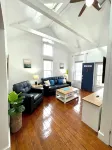 Charming Coastal Cape Cod w/ King Bed, Bikes, & Game Room near Downtown Beach - Wifi