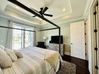 Garden City Pet friendly beach house! Golf car provided. 3 min ride to the beach - 4-Star