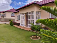 Home up Guest Apartments and Lodge