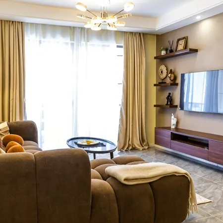 Chic Loft steps from Yaya Center | Pool + gym